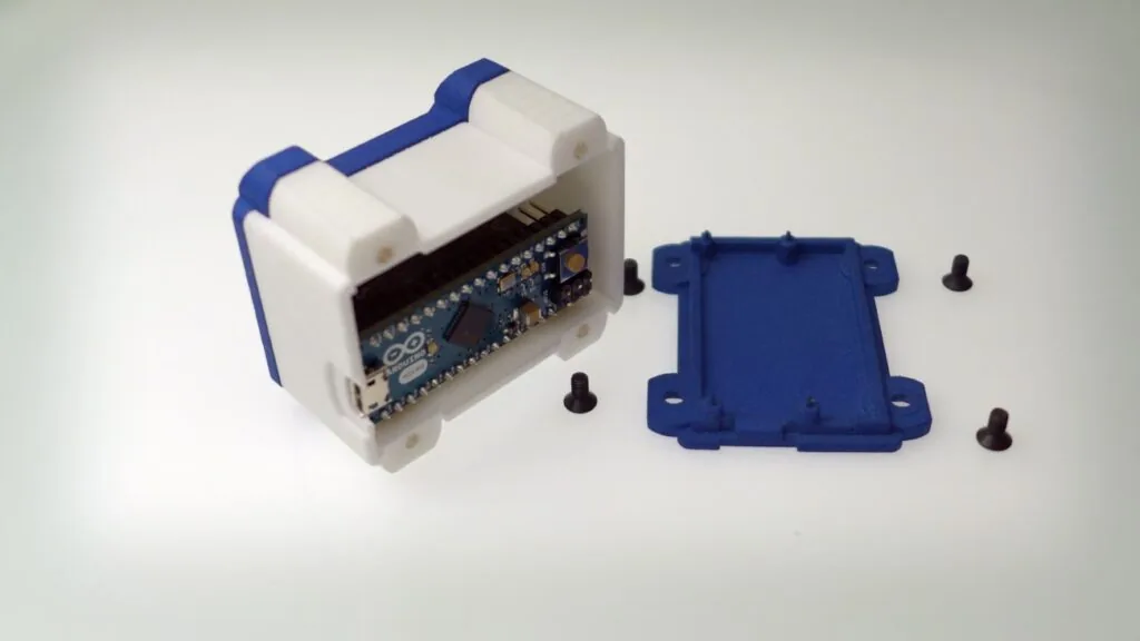 Original openQCM opened, with the Arduino board inside and the blue cover removed