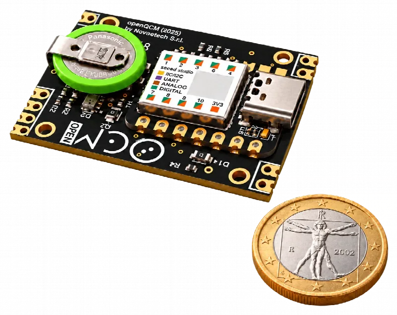 openQCM SpaceBug next to a one-euro coin, for scale