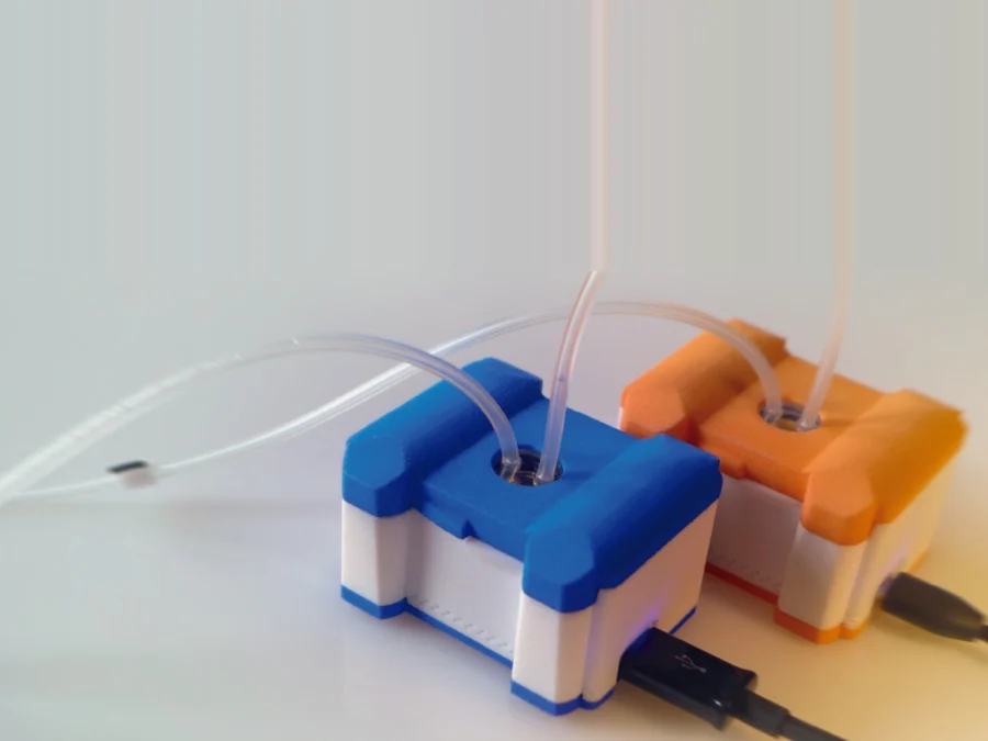 Two openQCM in a flow line, blue and orange cases